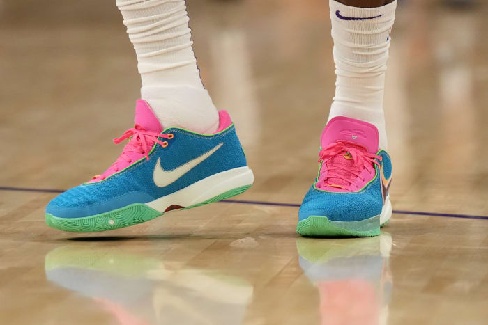 View blue and pink Nike LeBron shoes.